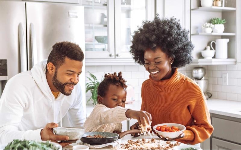 a family cooking together