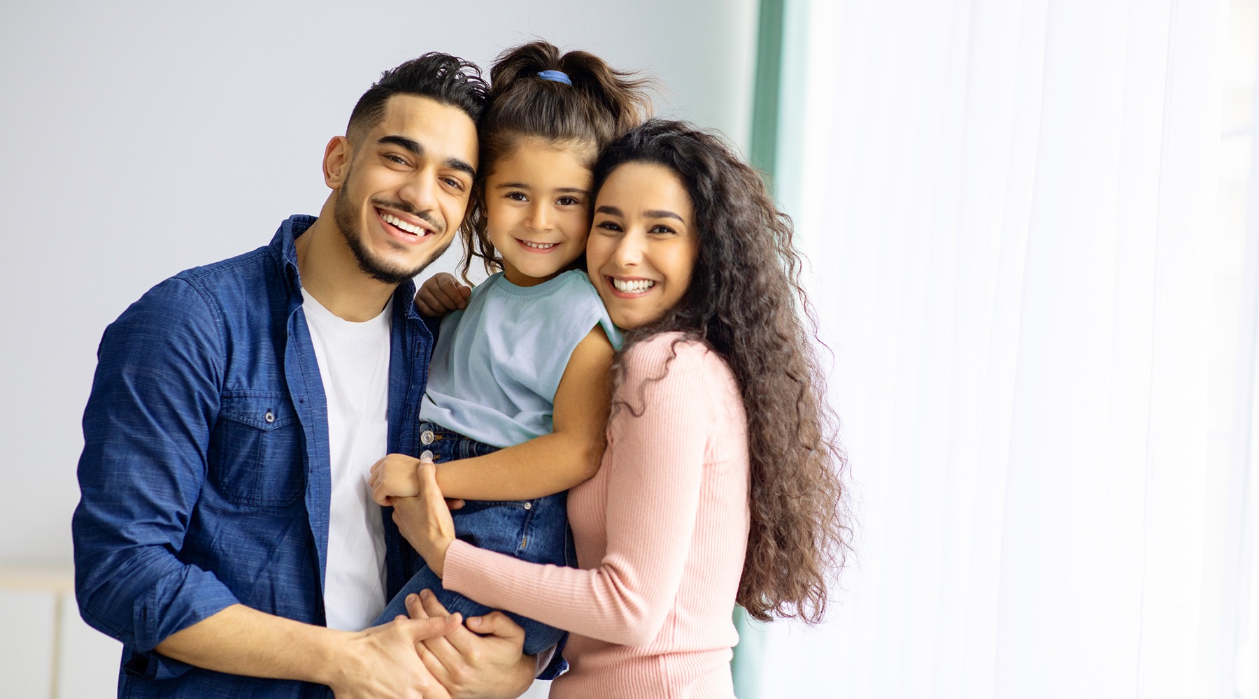 a family posing for a picture