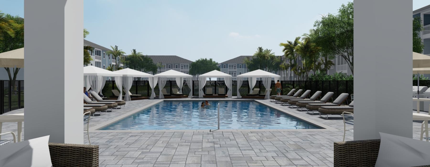 a pool surrounded by chairs and cabanas